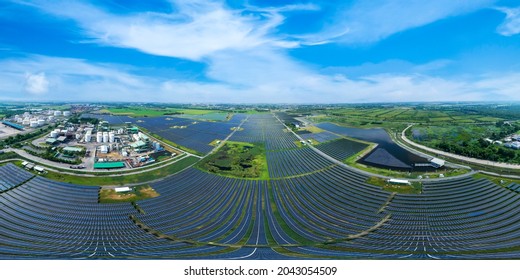 Aerial view of Solar Panels Farm (solar cell). Drone flight fly over solar panels field renewable green alternative energy concept in Thailand. solar energy. power plant.