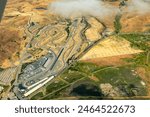 Aerial view of Sonoma Raceway in the golden grass fields and vinyards of wine country