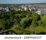 Aerial view of Southampton green East park with trees in the summer. City view towards Bitterne and Itchen river.