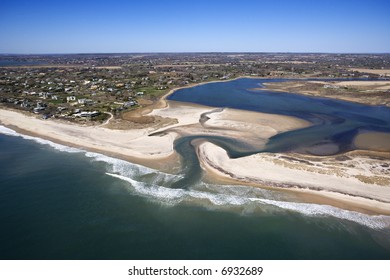 Aerial View Of Southampton, New York With Shoal And Inlet.