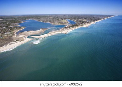 Aerial View Of Southampton, New York With Shoal And Inlet.