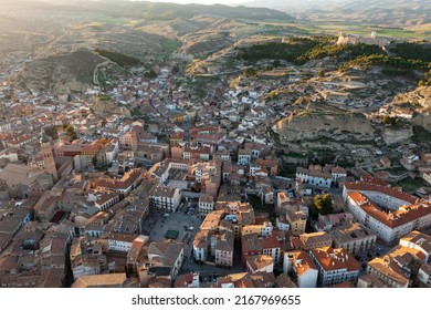 Aerial View Of Spanish Town Of Calatayud Located On Scenic Landscape Of Sistema Iberico Mountain Range On Sunny Spring Day, Province Of Zaragoza