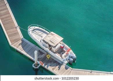 Aerial View Of Speed Boat And Floating Dock