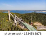 Aerial view of sports centre with three ski jump towers in Lahti, Finland