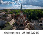 Aerial view of st. Joseph church in Podgorze district in Krakow, Poland at summer time with beautiful clouds on sky.