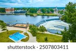 Aerial View of St. Joseph River with Flowing Waterfall and Urban Park