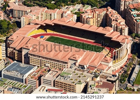 Aerial view of stadium of Monaco at sunset, view from mountain La Turbie, landmark of Monte-Carlo, port Cap Dail, port Fontvieille, Monaco Ville