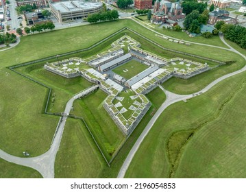 Aerial view of star shaped reconstructed 
Fort Stanwix in Rome New York with four angled wooden bastions and cannons - Shutterstock ID 2196054853