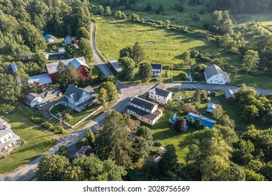 Aerial View Of Starrucca Pennsylvania In Waybe County A Historic Borough Along The New York State Border Consisting Of 2 Small Streets Rural Village In The Valley With A Barn, Inn, Post Office