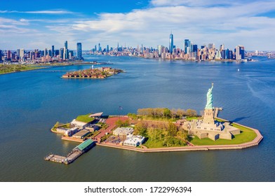 Aerial View of Statue of Liberty, Ellis Island and Lower Manhattan Skyline from New York Harbor near Liberty State Park in New Jersey