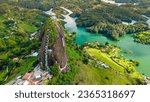 Aerial view of the Peñol stone next to the Lake or reservoir in Guatape, Antioquia, Colombia, located near the city of Medellín