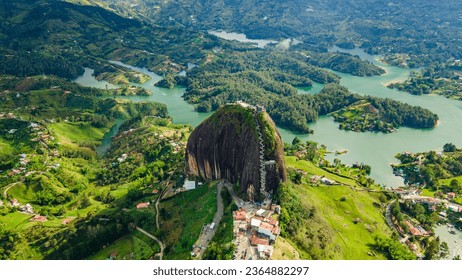 Aerial view of the Peñol stone next to the Lake or reservoir in Guatape, Antioquia, Colombia, located near the city of Medellín