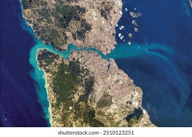 Aerial view of a stunning coastal landscape. Azure waters meet rugged headlands, creating a breathtaking scene. Explore the beauty of this natural wonder.. Elements of this image furnished by NASA - Powered by Shutterstock