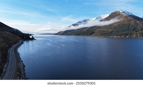 Aerial view of a stunning Scottish landscape, with majestic mountains, serene lakes, lush greenery, and untouched natural beauty, capturing the essence of Scotland's breathtaking scenery - Powered by Shutterstock