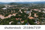 Aerial view of the suburb of Chiang Rai province flooding by Kok river after typhoon Yagi has swept Southeast Asia.