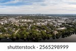 Aerial View of a Suburban Cityscape with Distant Skyline, Orlando, Florida, USA. April 4, 2024. 