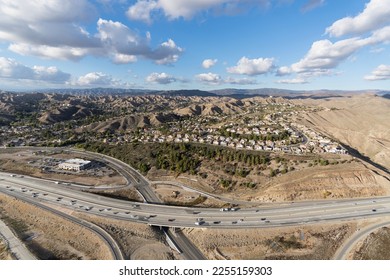 Aerial view of suburban landscape in the Santa Clarita area of Los Angeles County, California. - Shutterstock ID 2255159303