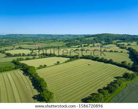 Similar – Image, Stock Photo Landscape with farmland and cloudy sky