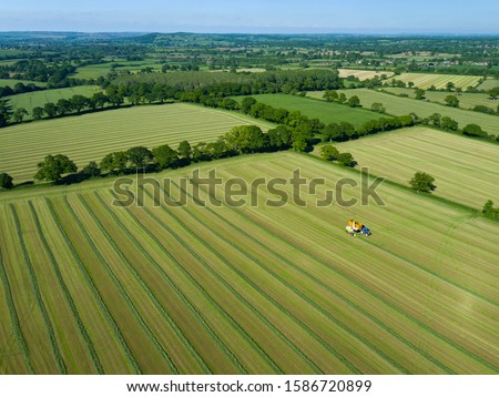 Similar – Image, Stock Photo Landscape with farmland and cloudy sky