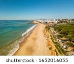 Aerial view of sunny Vilamoura, Quarteira in full sun of southern Portugal