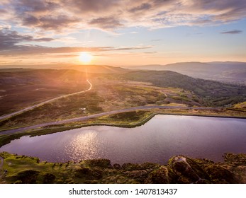 Aerial view at sunset Brecon Beacons. Keepers Pond, The Blorenge, Abergavenny, Wales, United Kingdom - Shutterstock ID 1407813437