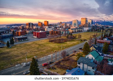 Aerial View Of A Sunset Over Downtown Anchorage, Alaska In Spring