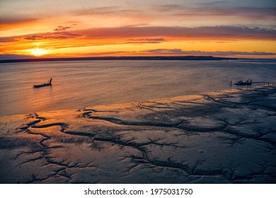 Aerial View Of A Sunset Over Downtown Anchorage, Alaska In Spring