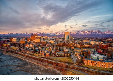 Aerial View Of A Sunset Over Downtown Anchorage, Alaska In Spring