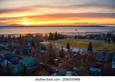 Aerial View Of A Sunset Over Downtown Anchorage, Alaska In Spring