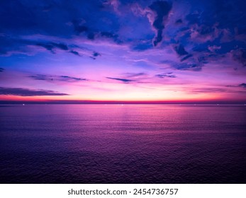 Aerial view sunset sky, Beautiful Light Sunset or sunrise over sea,Colorful dramatic majestic scenery sunset Sky, Amazing clouds and small waves in the ocean, Wonderful light cloud background - Powered by Shutterstock