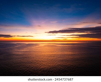 Aerial view sunset sky, Beautiful Light Sunset or sunrise over sea,Colorful dramatic majestic scenery sunset Sky, Amazing clouds and small waves in the ocean, Wonderful light cloud background - Powered by Shutterstock