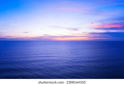 Aerial view sunset sky, Nature beautiful Light Sunset or sunrise over sea, Colorful dramatic majestic scenery Sky with Amazing clouds and waves in sunset sky blue light cloud background - Powered by Shutterstock