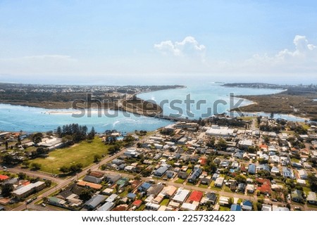 Aerial view of Swansea channel town and bridge on Pacific coast of NSW, Australia at Lake Macquarie entrance to the sea.