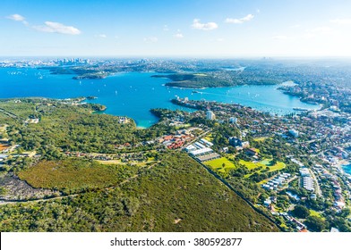 Aerial View Sydney Bay. View On Sydney Harbourside Suburbs From Above. Aerial View On Sydney Harbourside, Sydney CBD, Manly, Parramatta And Sydney Harbour National Park