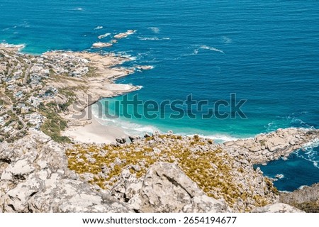 An aerial view of Table Mountain facing the ocean