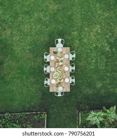 Aerial View Of Table Setting Outdoors In Garden Restaurant. Table Ready For Outdoors Meal Party.