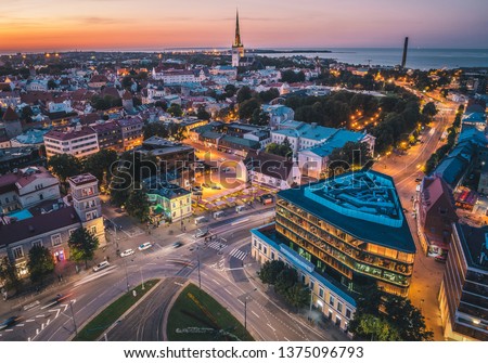 Aerial view of Tallinn Old Town and Baltic Sea at sunset. Summer evening in Estonia.