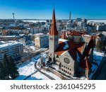 An aerial view of Tampere Cathedral during winter