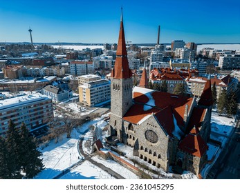 An aerial view of Tampere Cathedral during winter