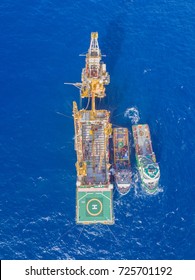 Aerial View of Tender Drilling Oil Rig (Barge Oil Rig) in The Middle of The Ocean - Shutterstock ID 725701192
