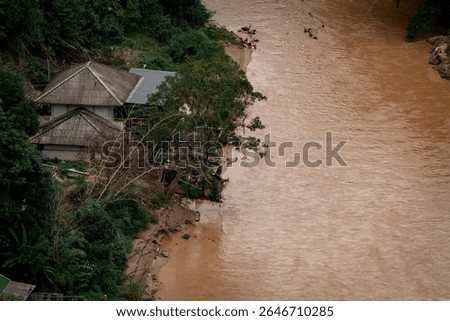 An aerial view of the Thai-Myanmar border during the construction of flood barriers by both Thailand and Myanmar to prevent flooding.