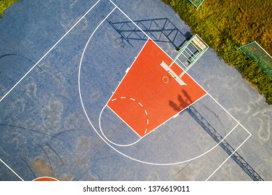 Aerial view, Top View, Bird eye view of school college with Basketball courts. basketball field in morning right.