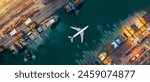 Aerial view and top view cargo plane flying above ship port in the export and import business and Smart logistics international goods. Shipping cargo to harbor by crane