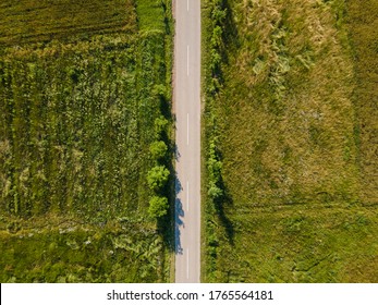 Aerial View Top Down From Above On The Country Road In Mountain Range In Between Green Grass And Trees Around - Nature Travel Concept Drone Photo On Stara Planina Old Mountain In Europe Serbia