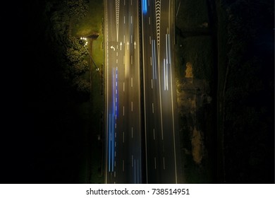 Aerial view top down light trail at highway