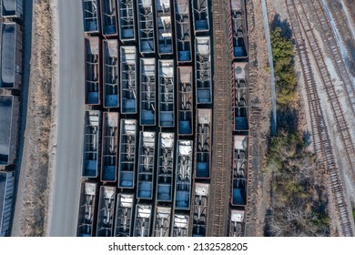 Aerial View Top Down Of Rail Cars In A Busy Train Yard