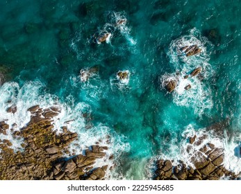 Aerial view Top down seashore. Waves crashing on rock cliff. Beautiful dark sea surface in sunny day summer background Amazing seascape top view seacoast at Intendance Beach, Mahe Seychelles - Shutterstock ID 2225945685