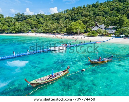 Aerial view or top view of tropical island beach with clear water at Banana beach, Coral Island, Koh Hey, Phuket, Thailand