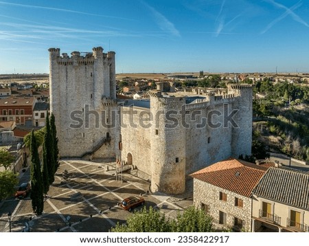 Aerial view of Torija medieval feudal castle in Guadalajara province Spain built by the templar knights. Rectangular structure with 3 round towers and a square keep with turrets made of limestone 