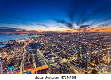 Aerial view of Toronto city at night
					